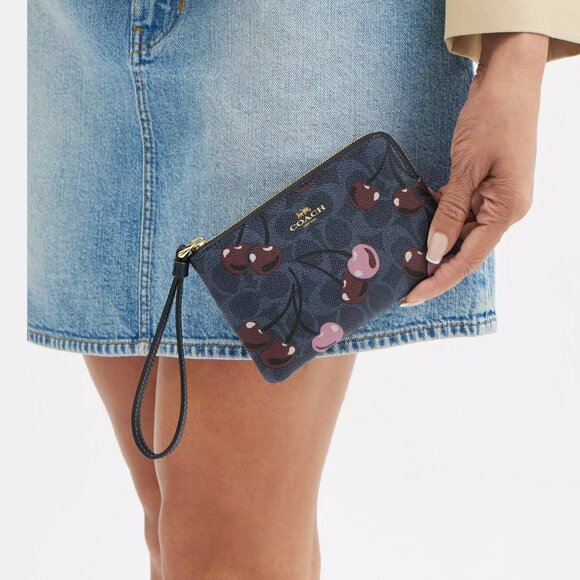 NWT - Corner Zip Wristlet In Signature Canvas W/ Cherry Print Color: Gold/Denim - Picture 3 of 6